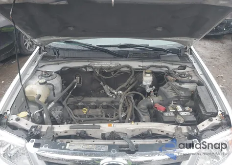 2011 Mazda Tribute I Sport z USA, uszkodzony, nr VIN 4F2CY0C70BKM02400